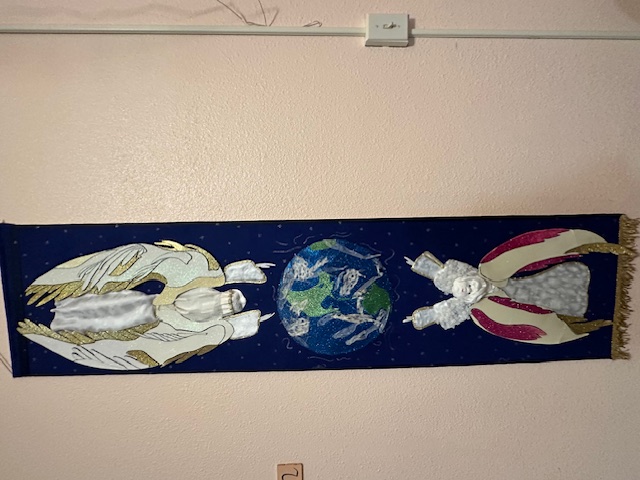 Angels with earth to celebrate the spiritual world